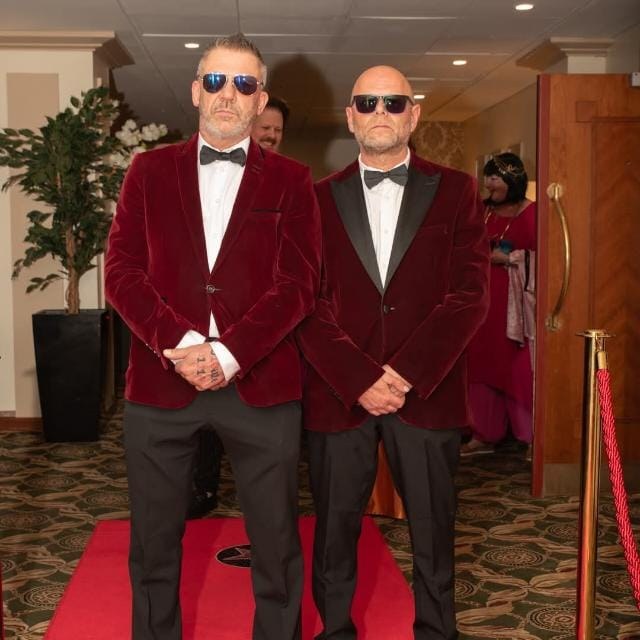 Magic and Tricky in red velvet jackets on the red carpet